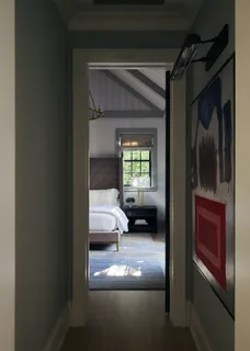 a room with furniture and a potted plant