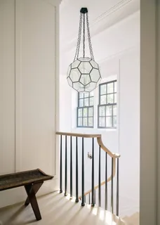 a view of entryway with a large window and wooden floor
