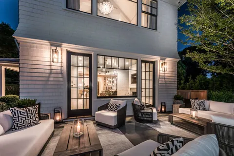 a outdoor space with patio the couches and a potted plant on a table