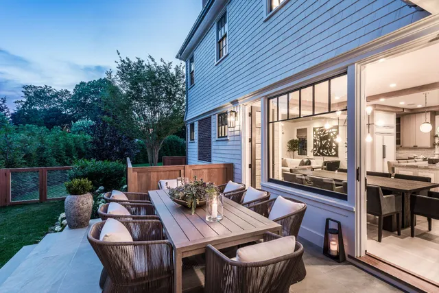 a outdoor dining space with furniture and outdoor view
