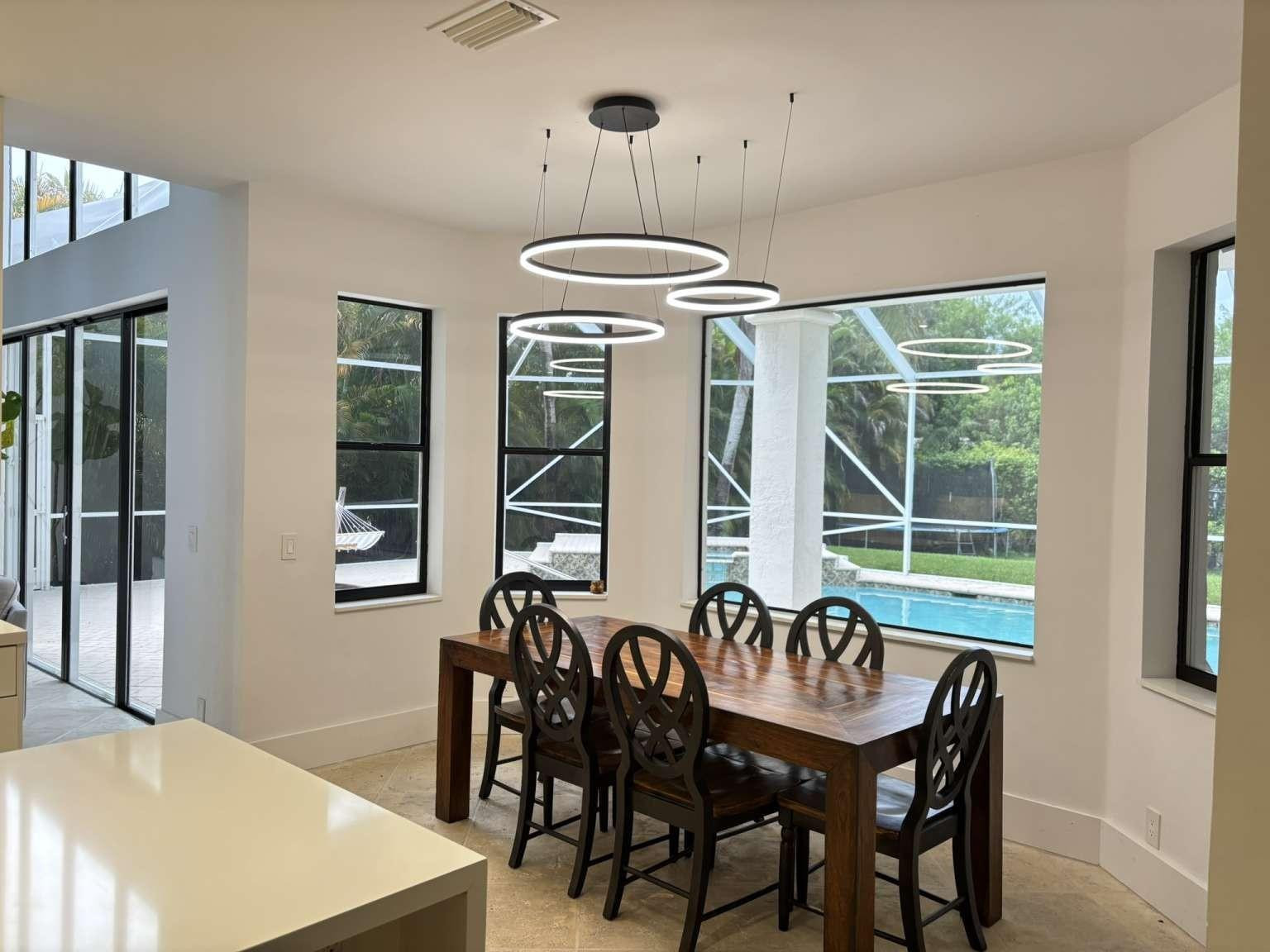 11119 Blue Coral Drive Boca Raton, FL 33498 - Photo 19 of 36 a view of a dining room with furniture window and outside view