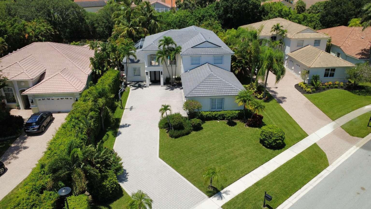 11119 Blue Coral Drive Boca Raton, FL 33498 - Photo 2 of 36 an aerial view of a house
