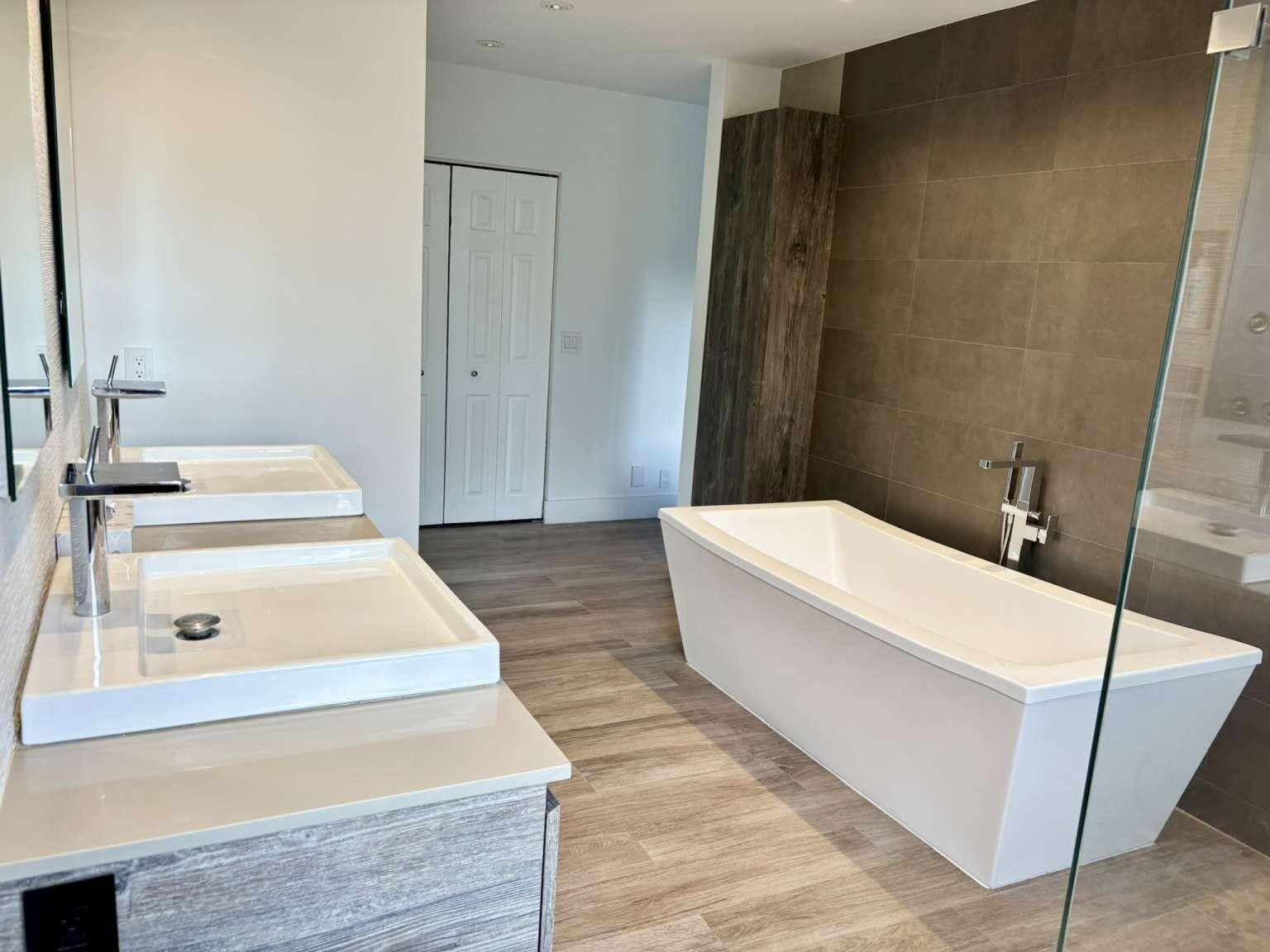 11119 Blue Coral Drive Boca Raton, FL 33498 - Photo 25 of 36 a bathroom with a sink and a mirror
