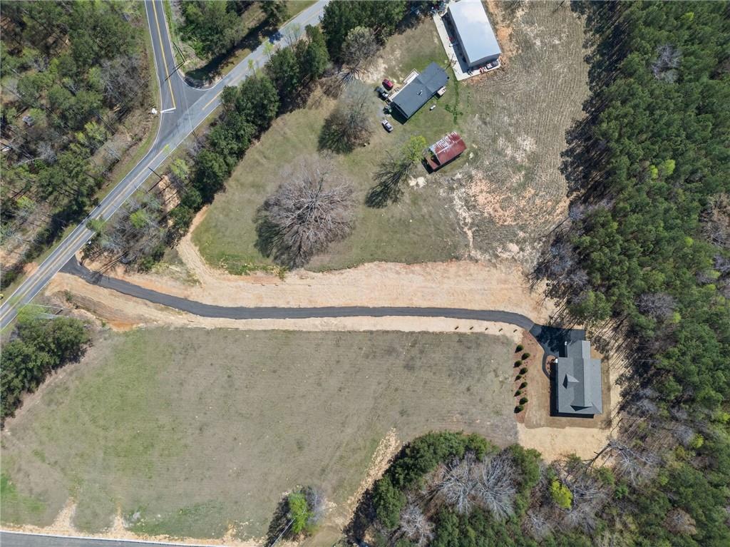 3512 Vinson Mountain Road Rockmart, GA 30153 - Photo 46 of 51 an aerial view of a house with a yard and large tree