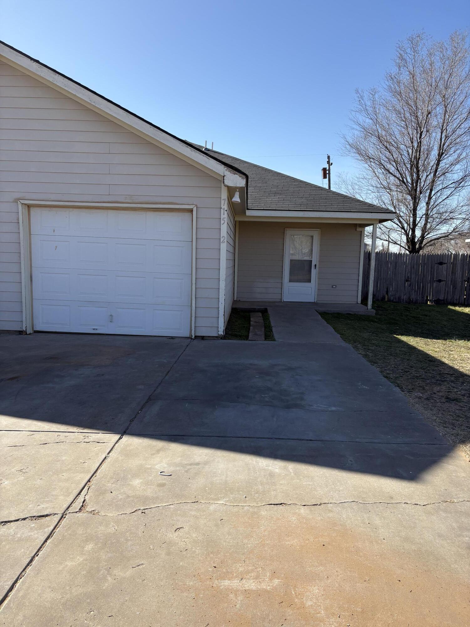 715 43rd Street, Unit 1&2 Lubbock, TX 79404 - Photo 2 of 13 a view of backyard of house