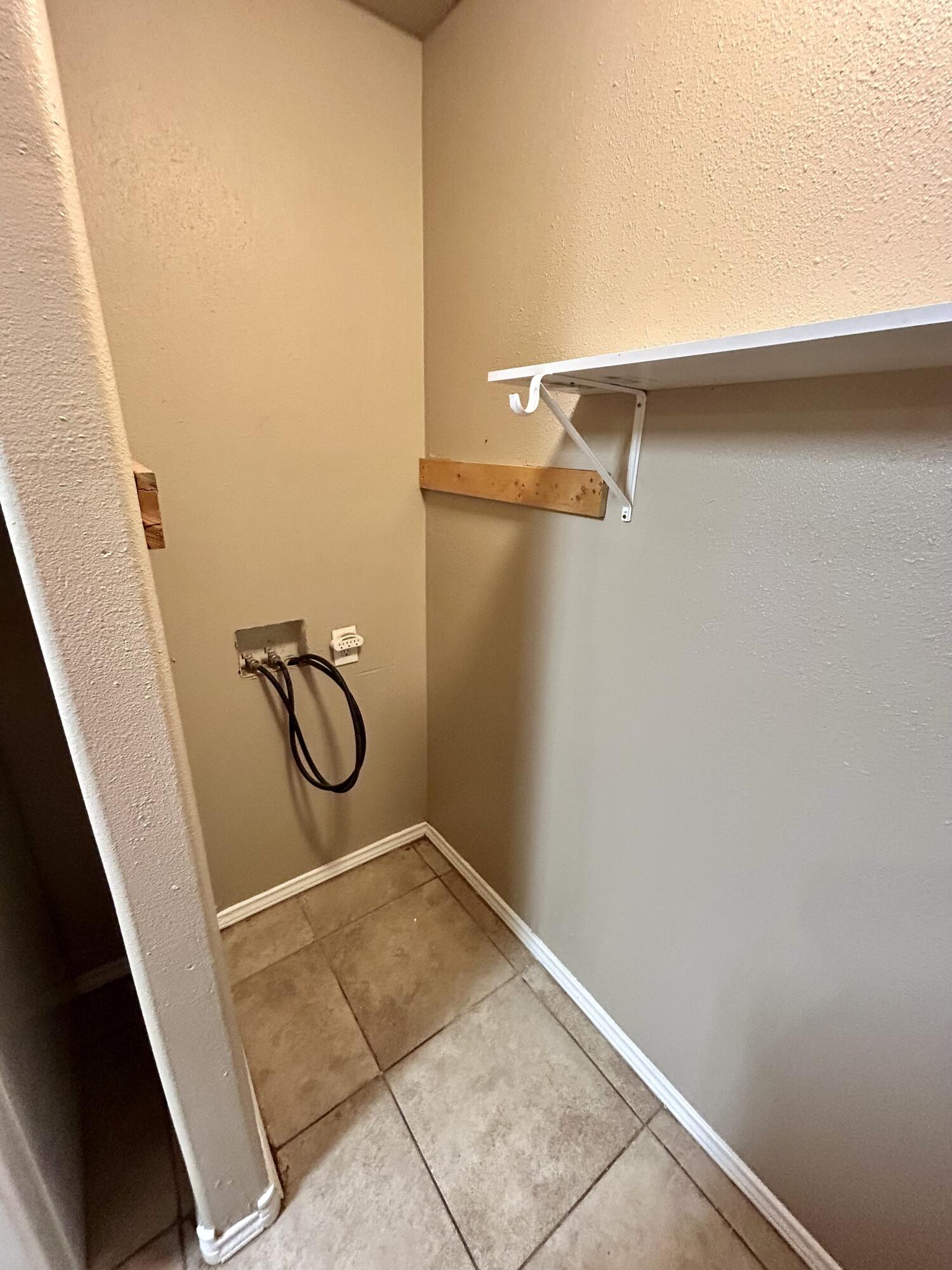 715 43rd Street, Unit 1&2 Lubbock, TX 79404 - Photo 6 of 13 a bathroom with a shower