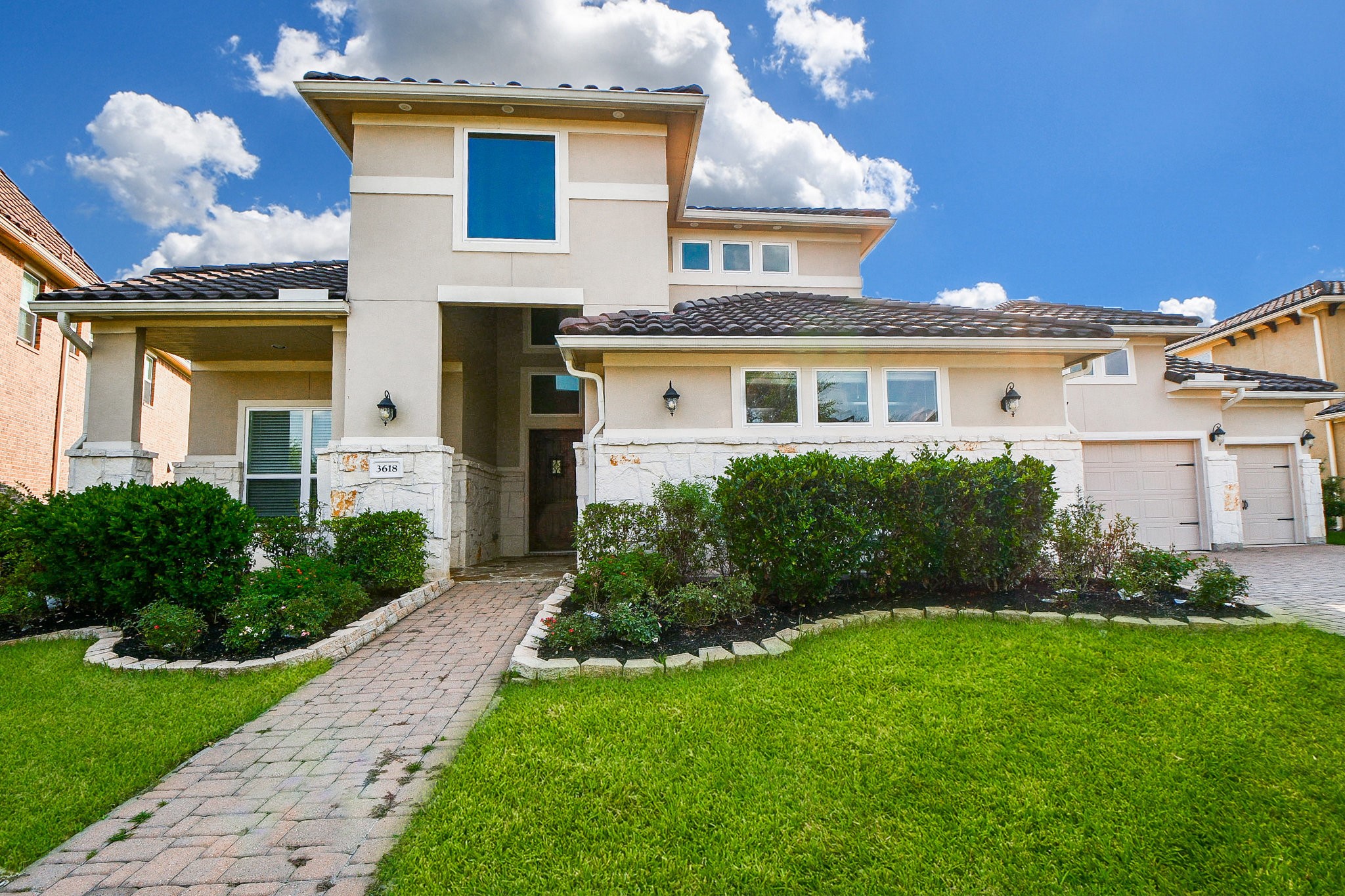 3618 Meandering Spring Drive Katy, TX 77494 - Photo 1 of 50 a front view of a house with a yard