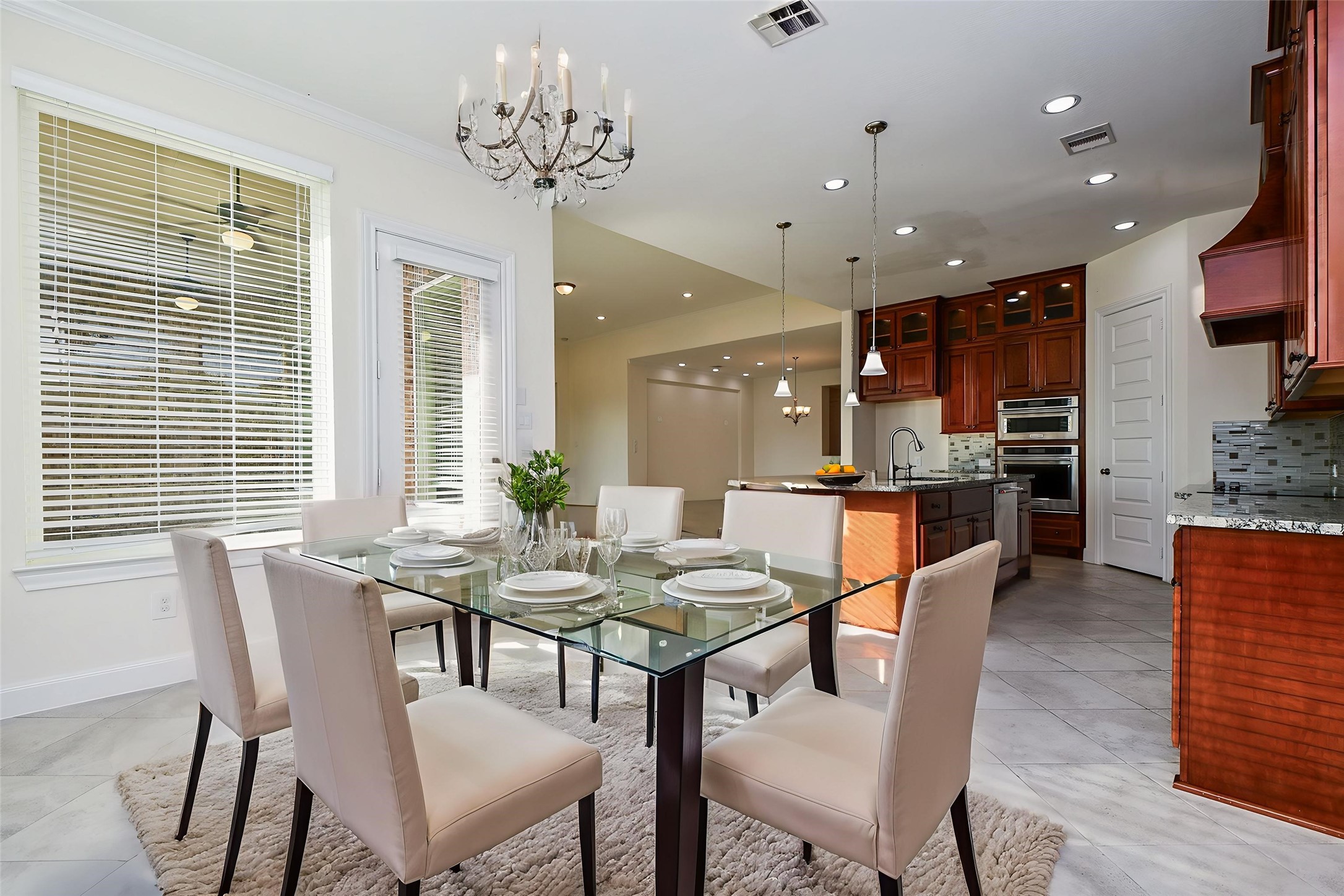 3618 Meandering Spring Drive Katy, TX 77494 - Photo 18 of 50 a view of a dining room with furniture window and wooden floor