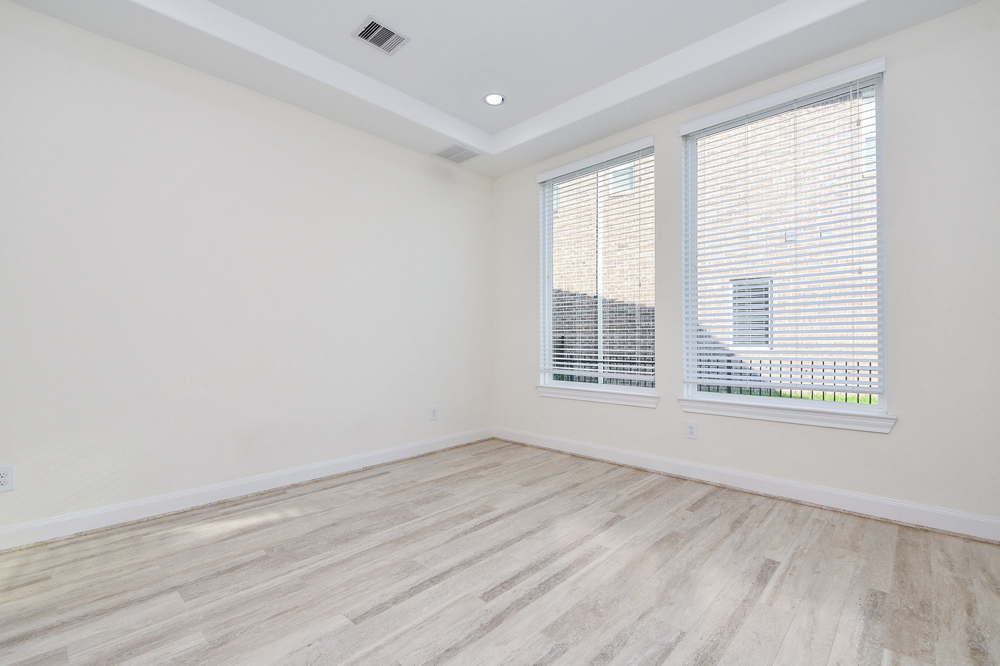 3618 Meandering Spring Drive Katy, TX 77494 - Photo 20 of 50 a view of an empty room with wooden floor and a window