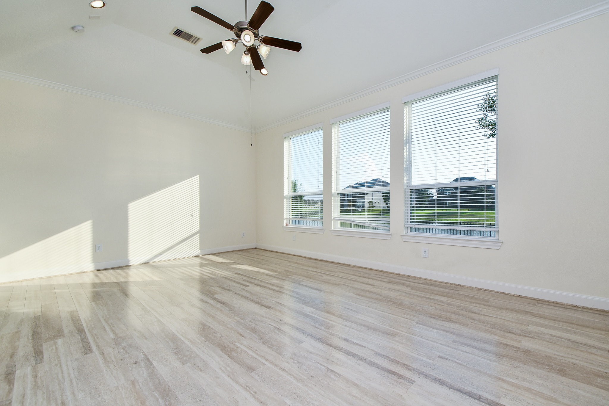 3618 Meandering Spring Drive Katy, TX 77494 - Photo 25 of 50 a view of an empty room with wooden floor and a window