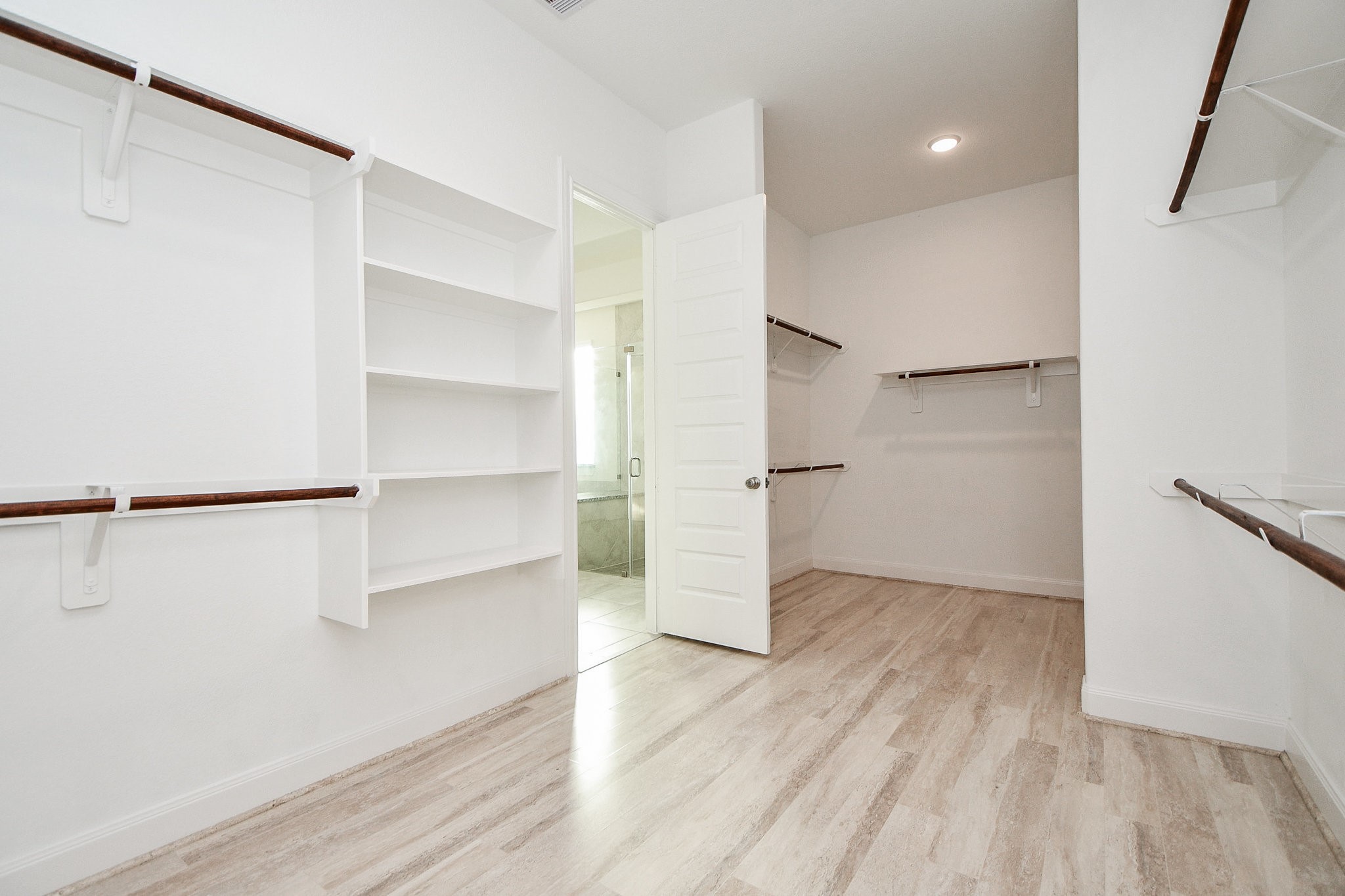3618 Meandering Spring Drive Katy, TX 77494 - Photo 29 of 50 a view of walk in closet with empty racks