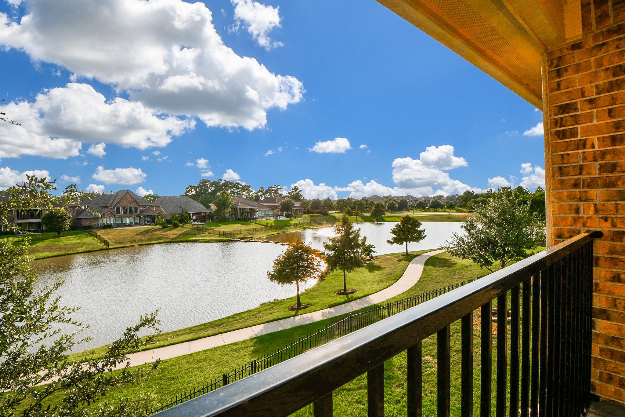 3618 Meandering Spring Drive Katy, TX 77494 - Photo 44 of 50 a view of a lake from a balcony