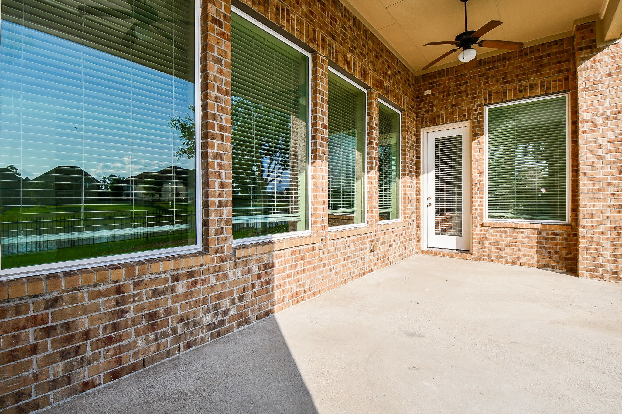 3618 Meandering Spring Drive Katy, TX 77494 - Photo 46 of 50 a view of house with backyard and glass windows