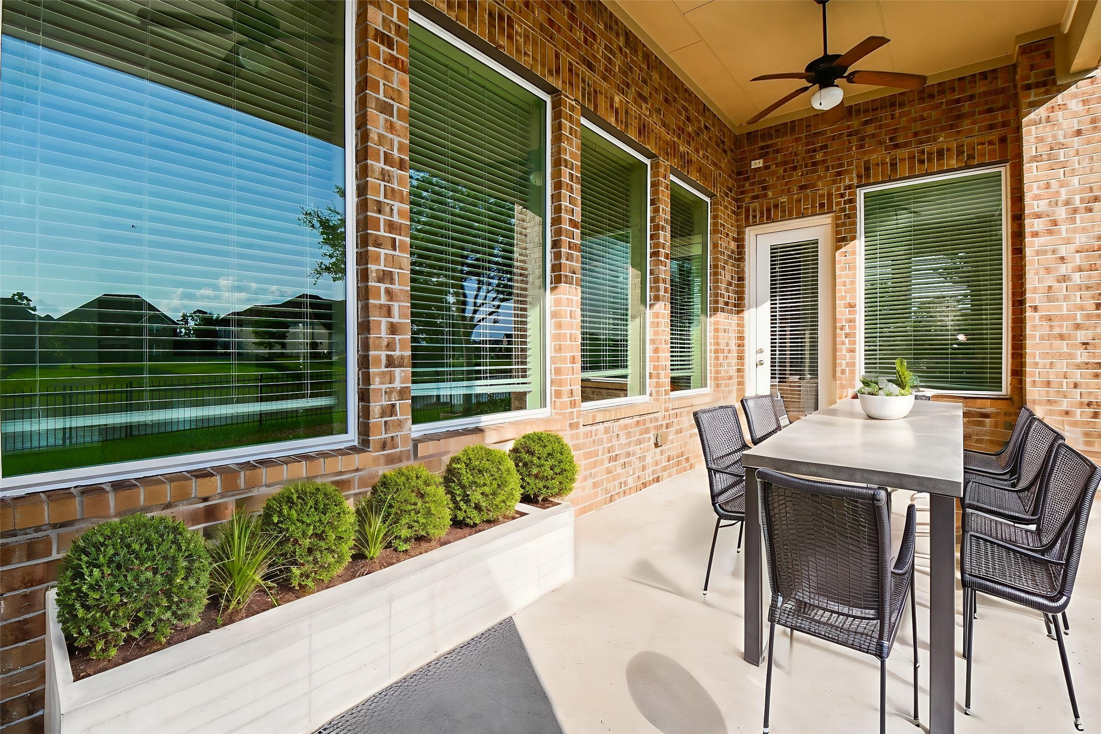 3618 Meandering Spring Drive Katy, TX 77494 - Photo 47 of 50 a view of a patio with table and chairs