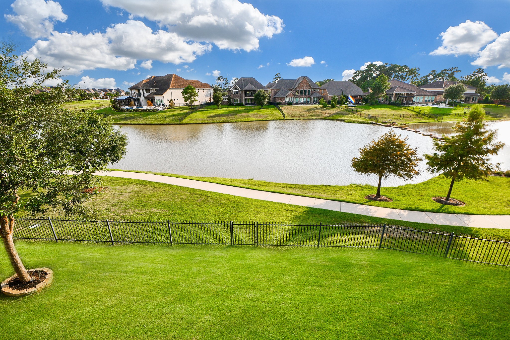 3618 Meandering Spring Drive Katy, TX 77494 - Photo 48 of 50 a view of a lake with a big yard
