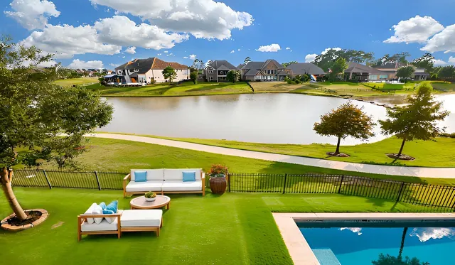a view of a lake with a big yard
