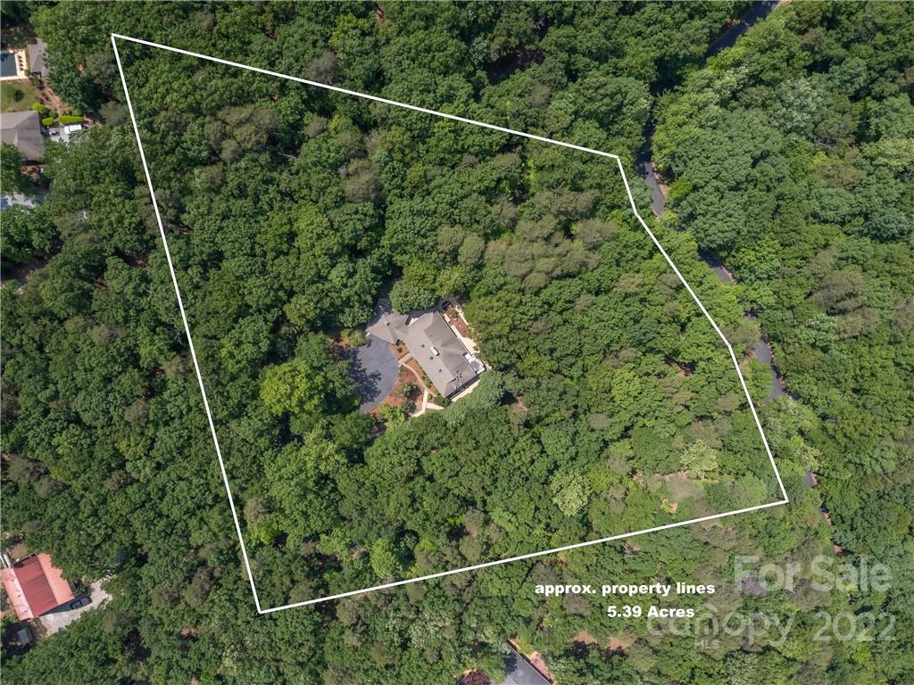 563 Fox Run Lane Tryon, NC 28782 - Photo 45 of 48 a view of a yard and basketball court