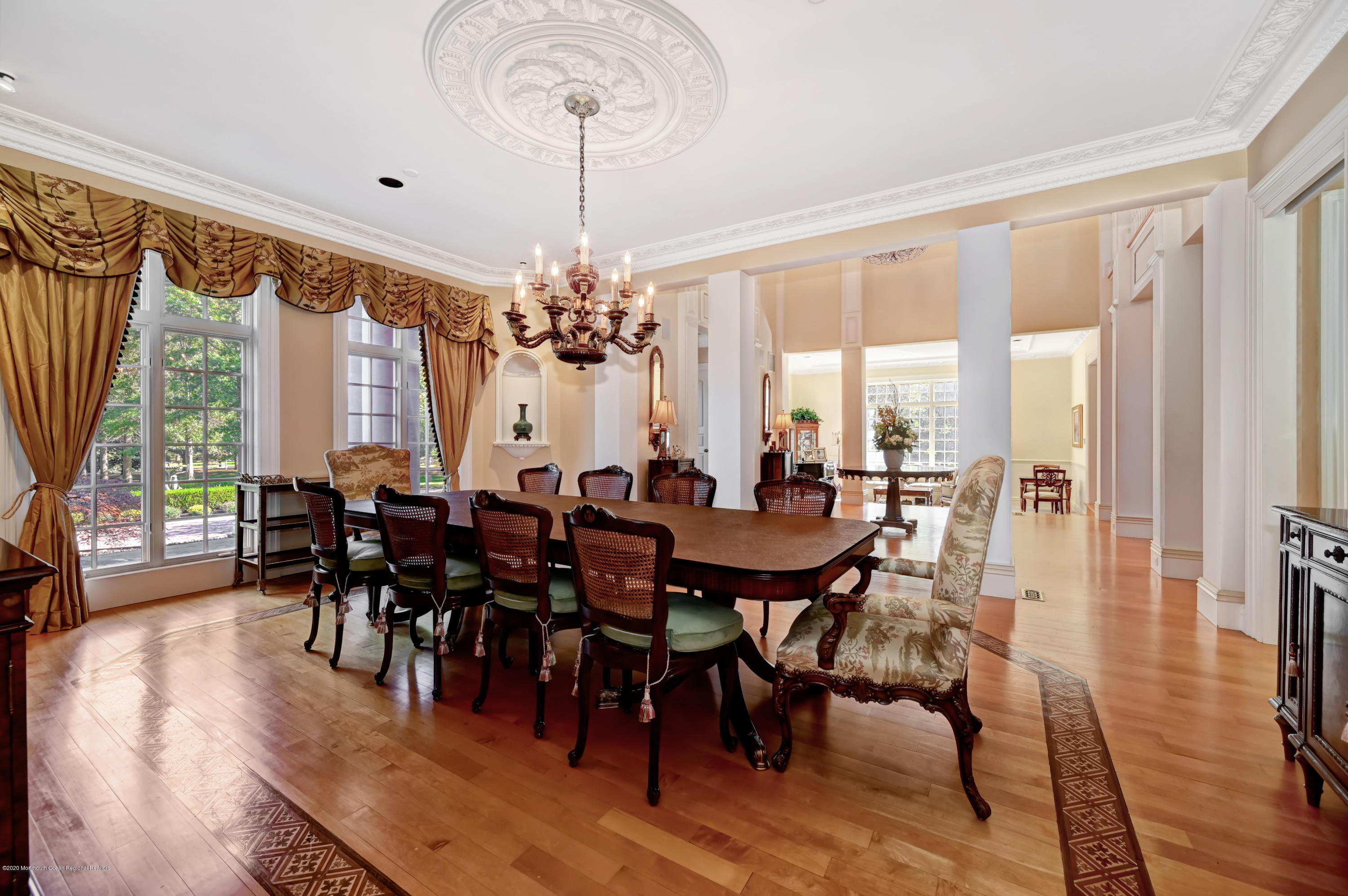 1 Laredo Drive Colts Neck, NJ 07722 - Photo 19 of 78 a view of a dining room with furniture window and wooden floor