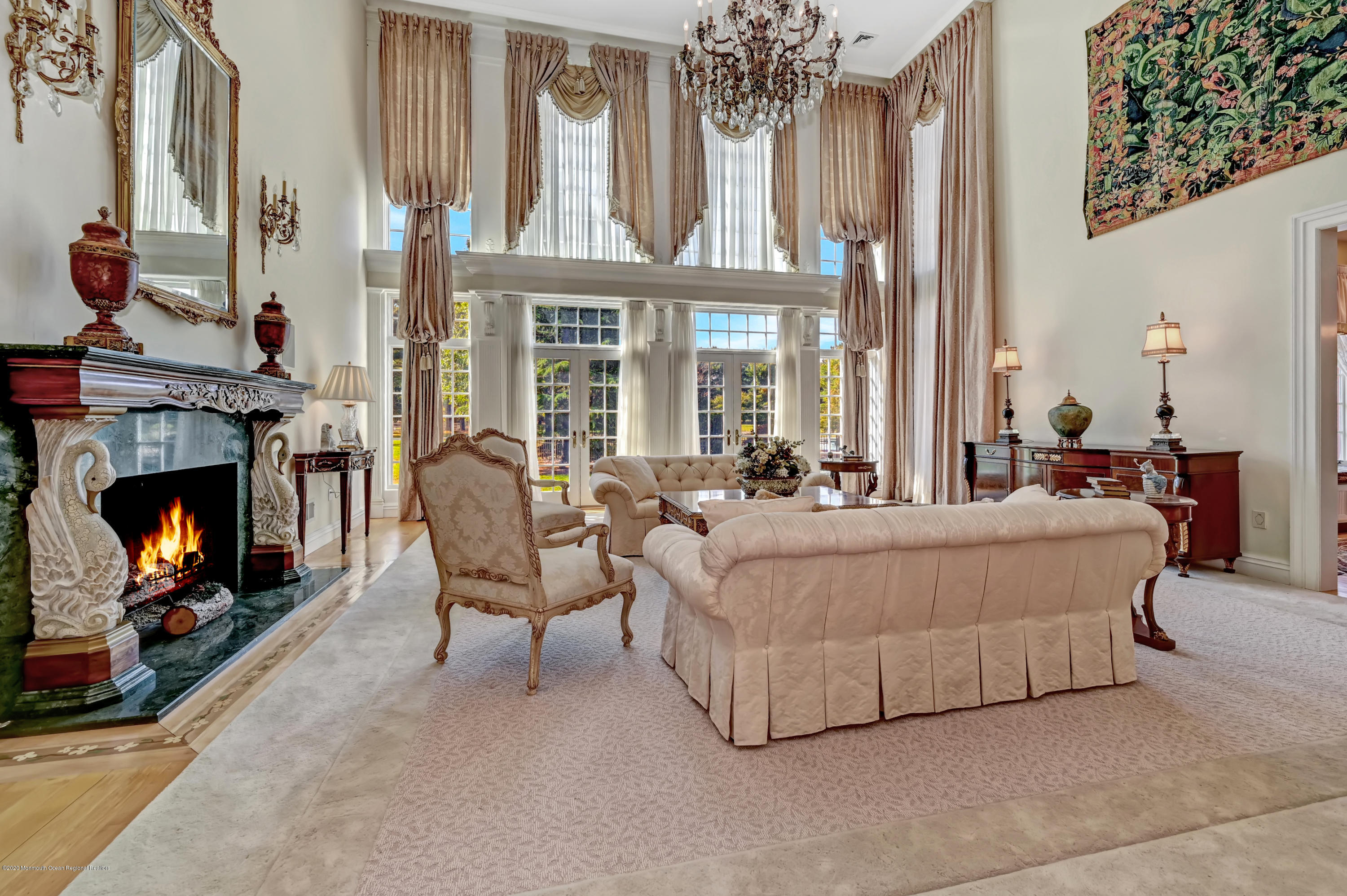 1 Laredo Drive Colts Neck, NJ 07722 - Photo 23 of 78 a living room with furniture and a fireplace