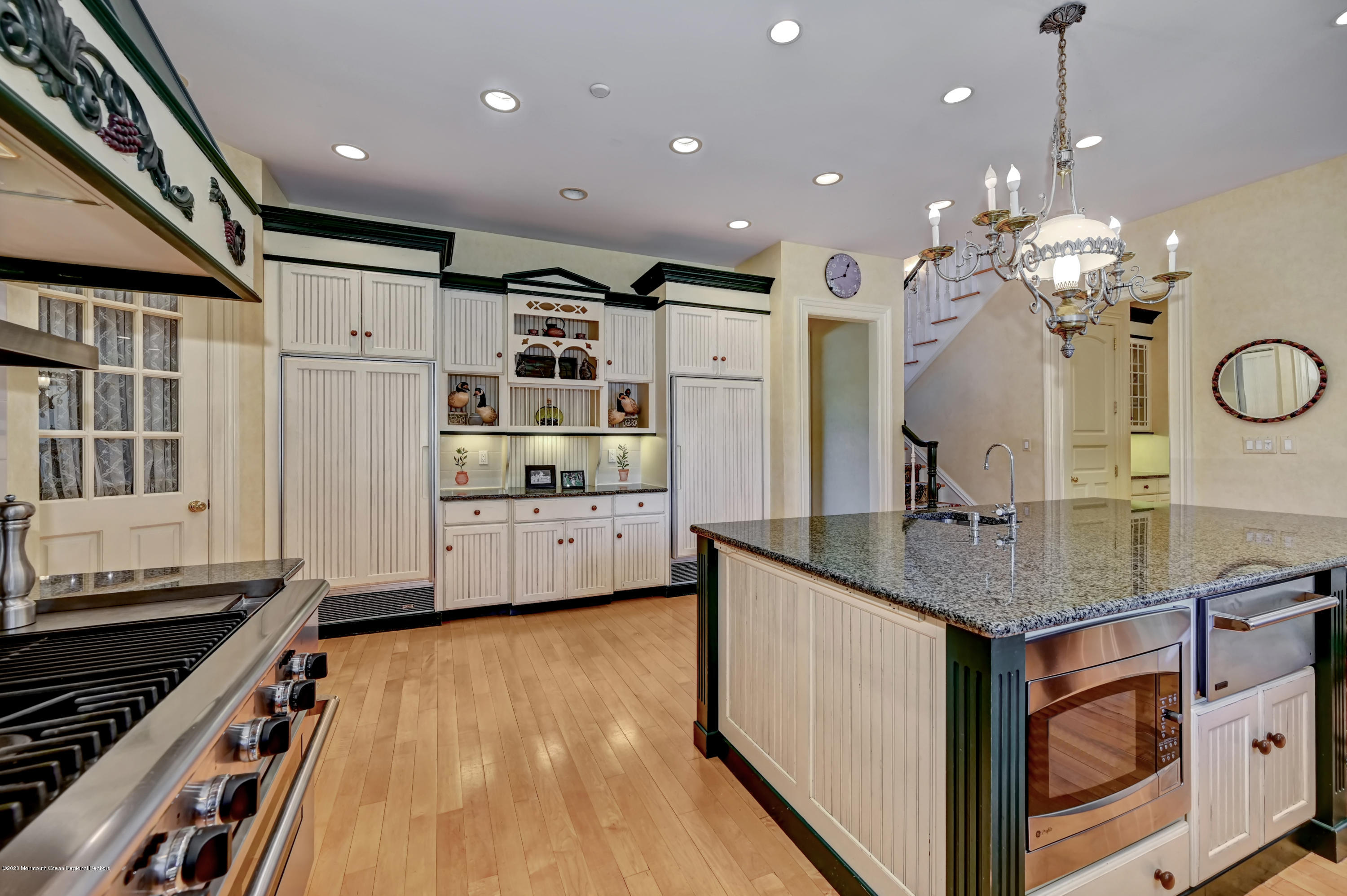 1 Laredo Drive Colts Neck, NJ 07722 - Photo 26 of 78 a kitchen with stainless steel appliances granite countertop a sink a stove and a refrigerator