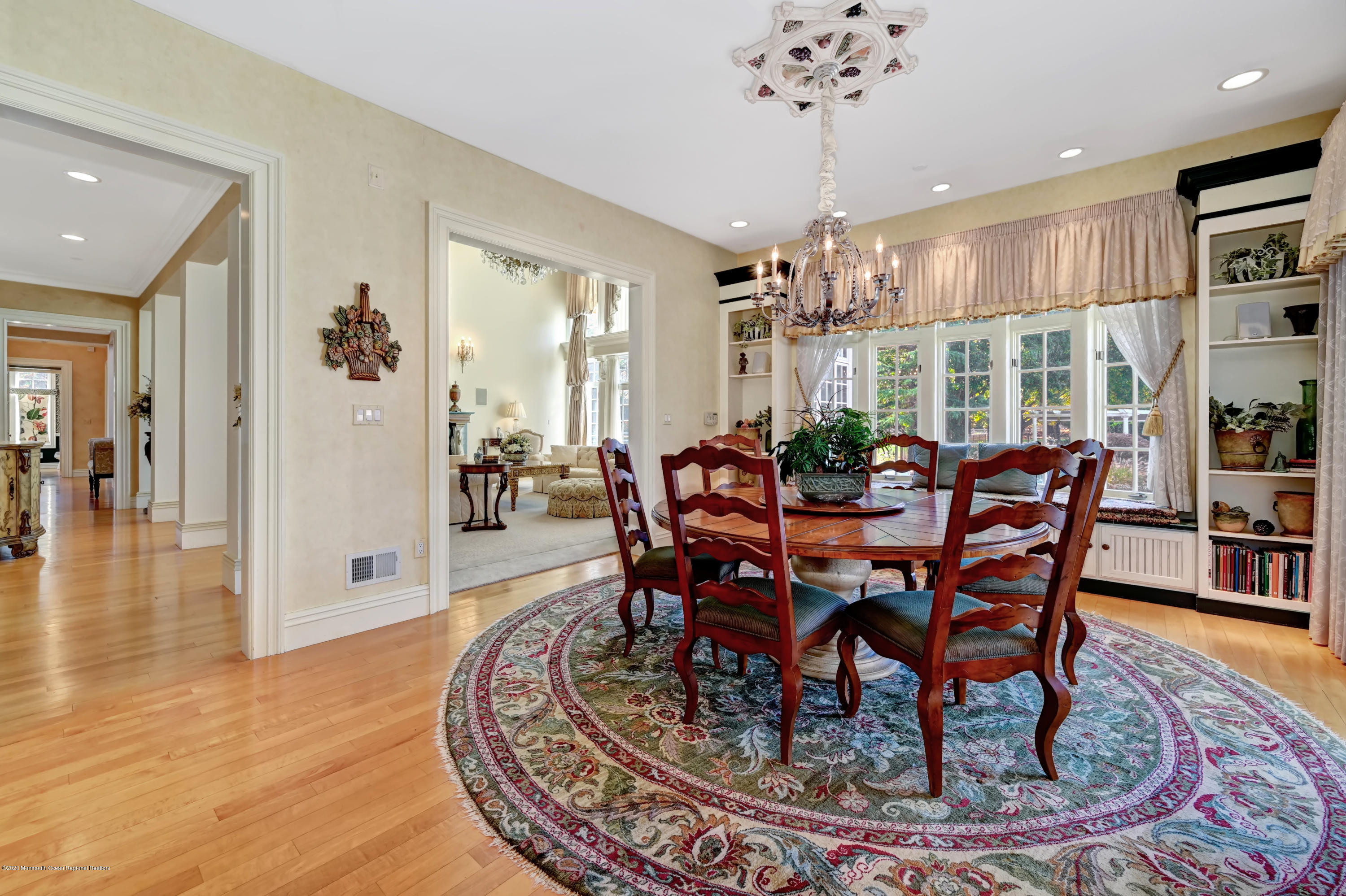 1 Laredo Drive Colts Neck, NJ 07722 - Photo 31 of 78 a view of a dining room with furniture window and wooden floor
