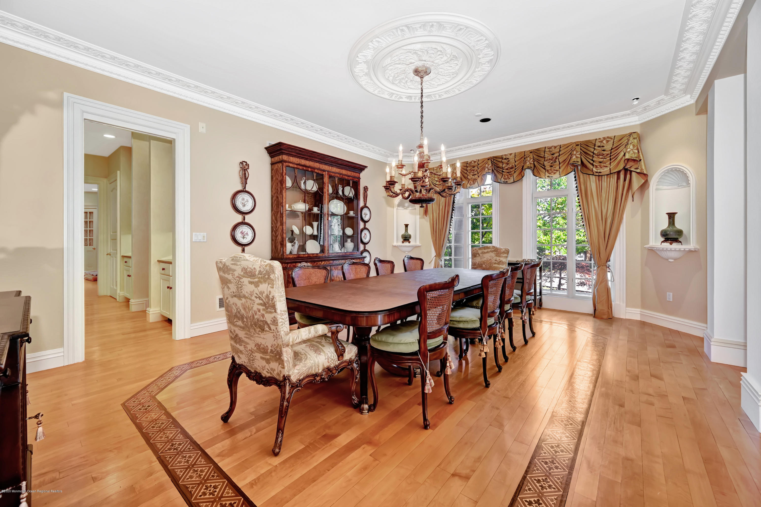 1 Laredo Drive Colts Neck, NJ 07722 - Photo 36 of 78 a view of a dining room with furniture window and wooden floor