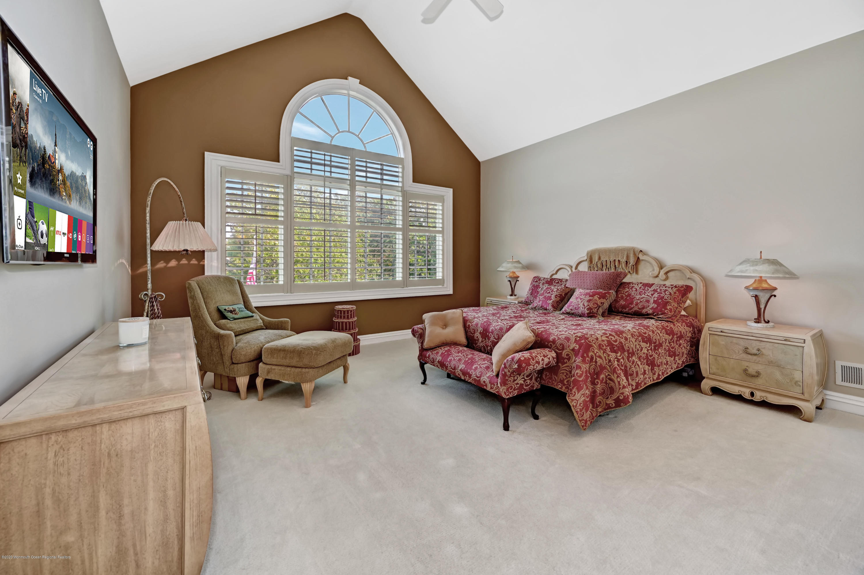 1 Laredo Drive Colts Neck, NJ 07722 - Photo 54 of 78 a spacious bedroom with a bed and a couch