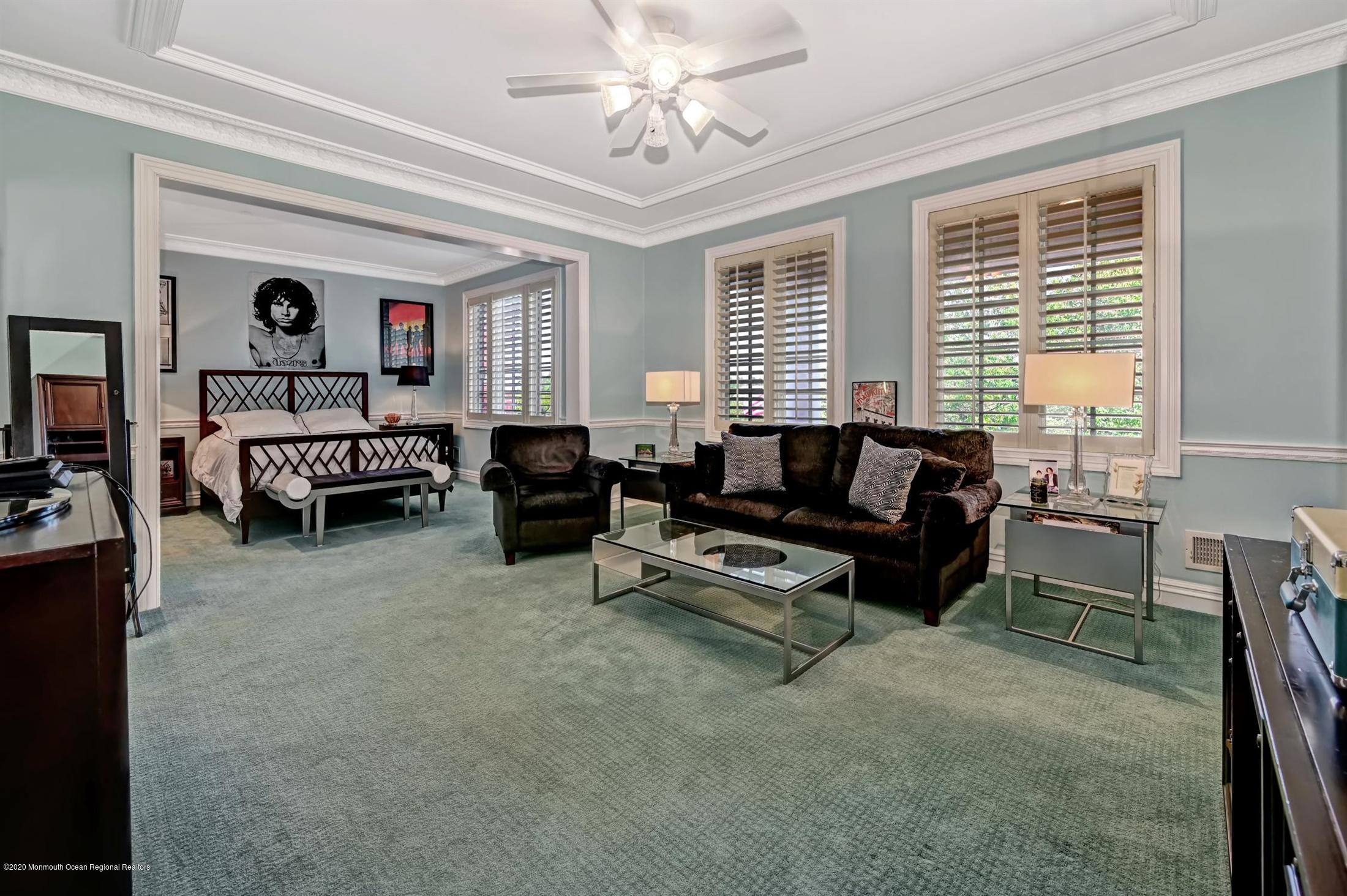 1 Laredo Drive Colts Neck, NJ 07722 - Photo 59 of 78 a living room with furniture ceiling fan and a window