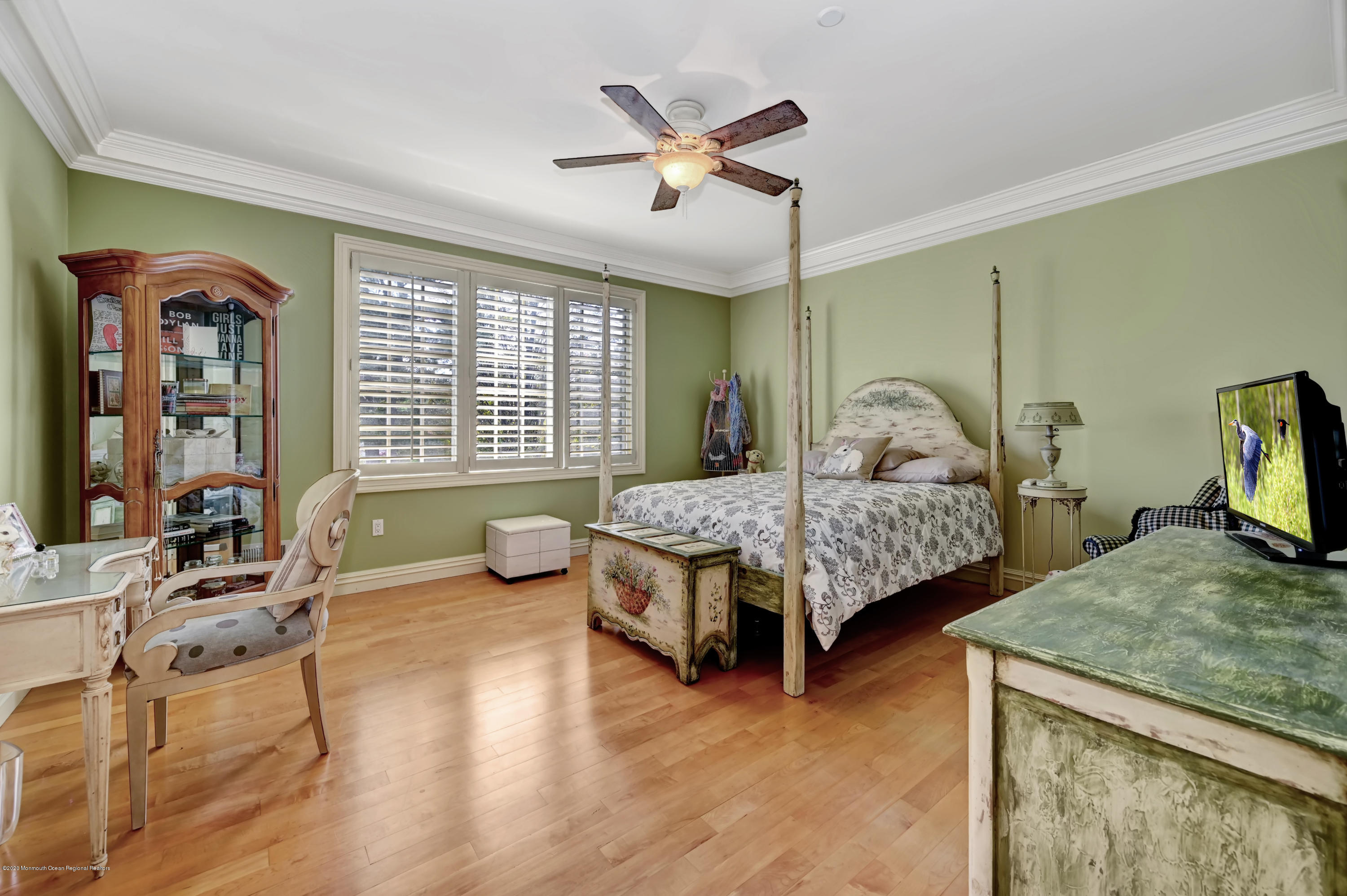 1 Laredo Drive Colts Neck, NJ 07722 - Photo 62 of 78 a bedroom with a bed and a table