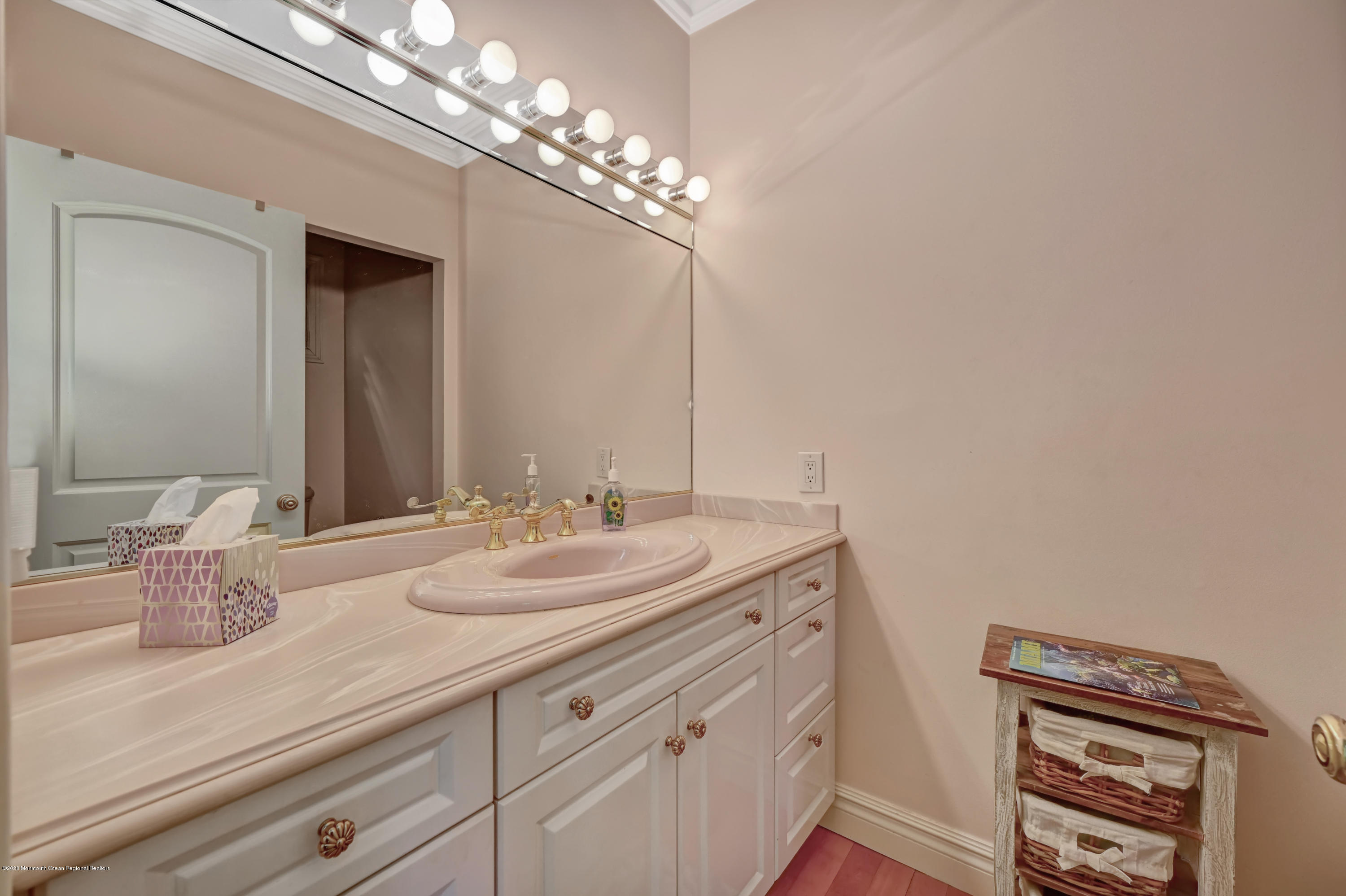 1 Laredo Drive Colts Neck, NJ 07722 - Photo 63 of 78 a bathroom with a sink and a mirror