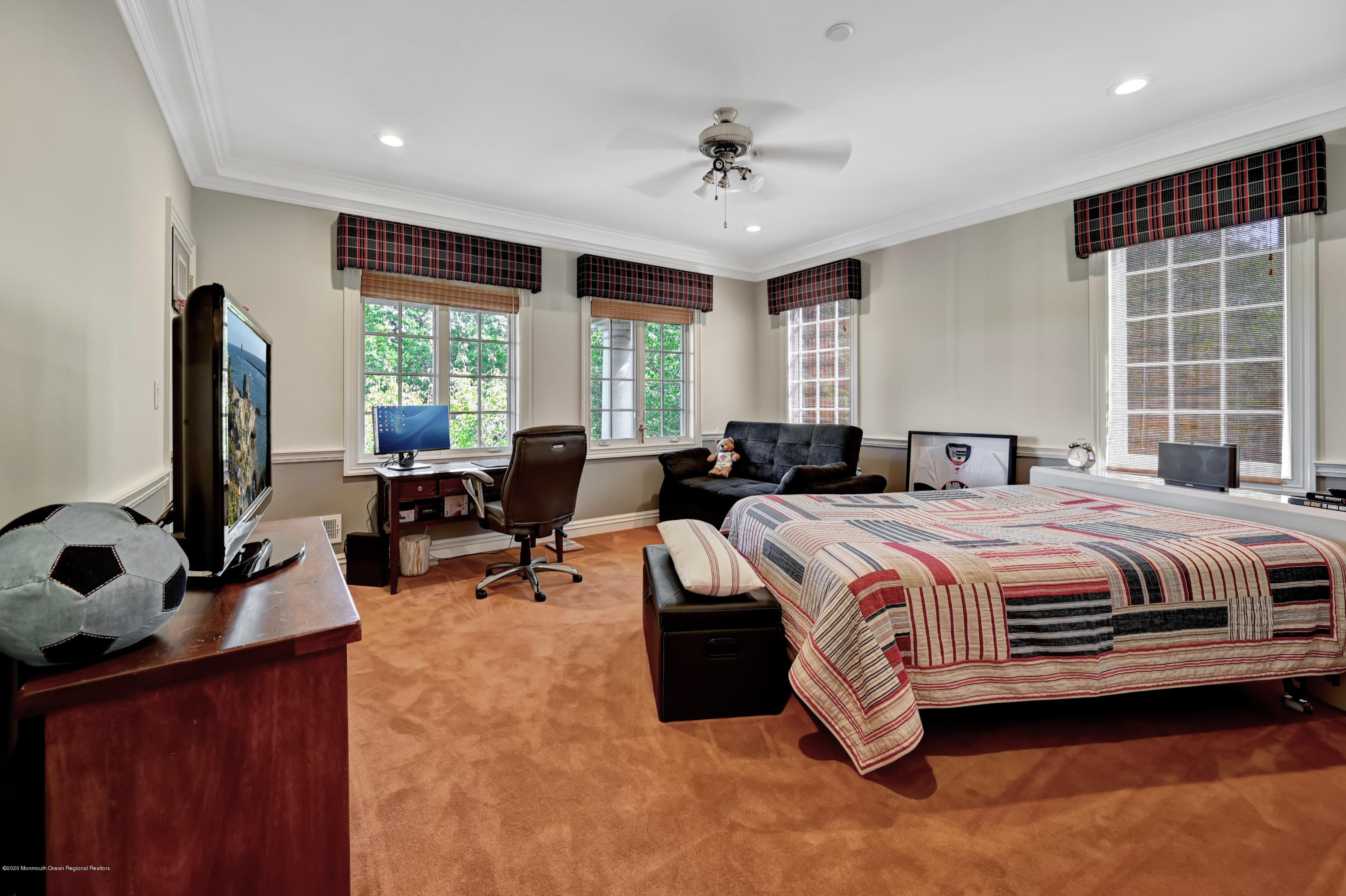 1 Laredo Drive Colts Neck, NJ 07722 - Photo 64 of 78 a spacious bedroom with a large bed and a flat tv screen on dresser