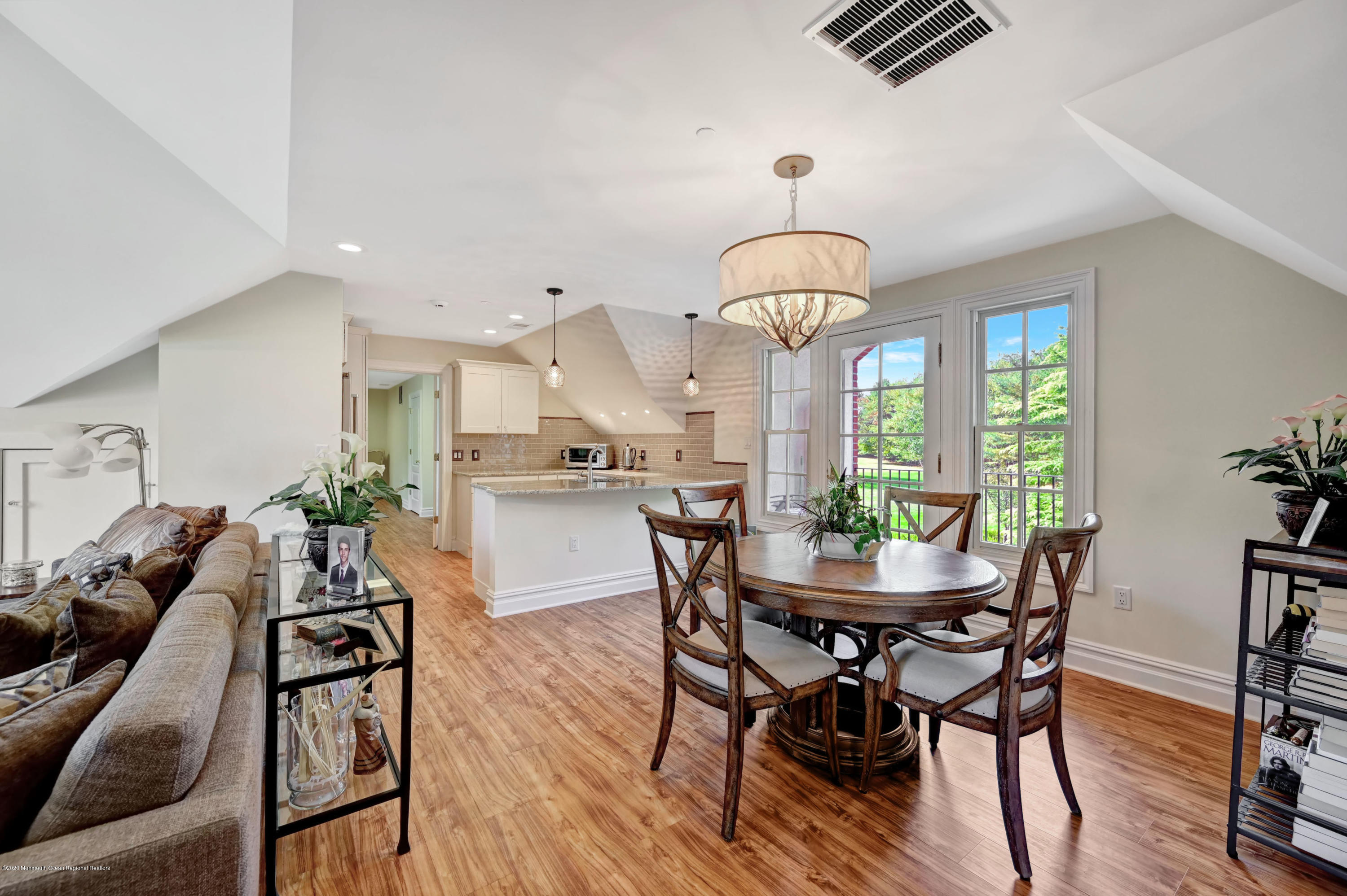 1 Laredo Drive Colts Neck, NJ 07722 - Photo 70 of 78 a view of a dining room with furniture window and wooden floor