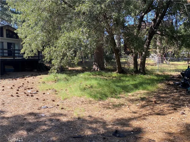 a view of a two chairs in the roof deck
