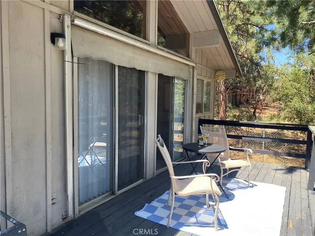 a kitchen with a stove a sink and a cabinets