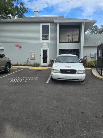 a view of a playground with basketball court