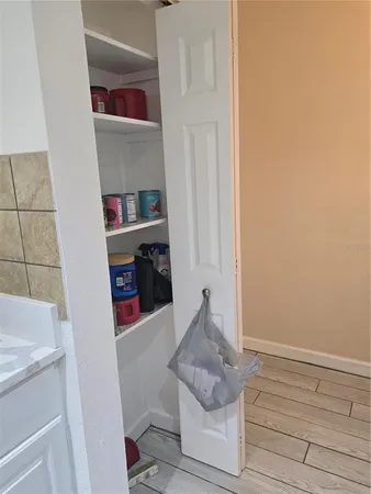 a room with storage and utility