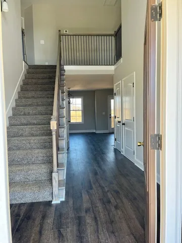 a view of entryway with wooden floor