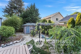 3306 Northeast 7th Place Renton, WA 98056 - Photo 11 of 11 a view of a house with a yard