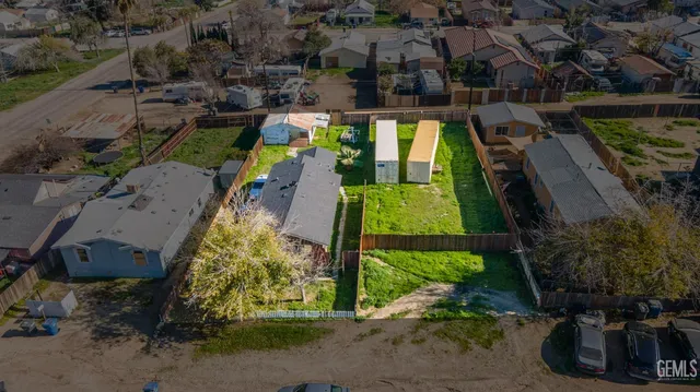 an aerial view of a house with a garden