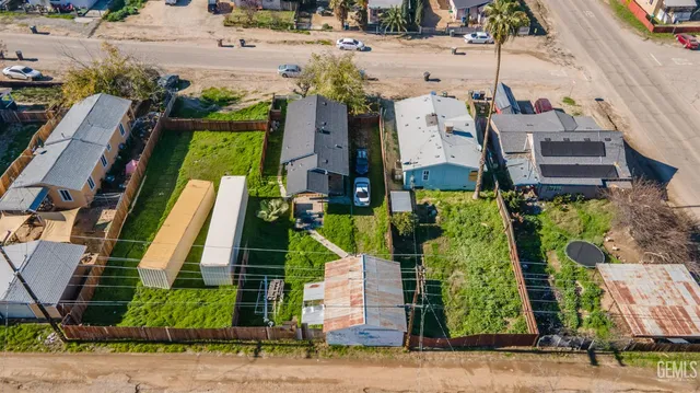an aerial view of a house with a garden