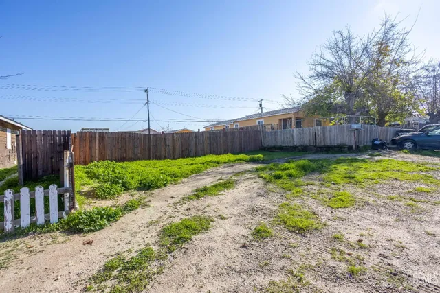 a view of a backyard with a garden