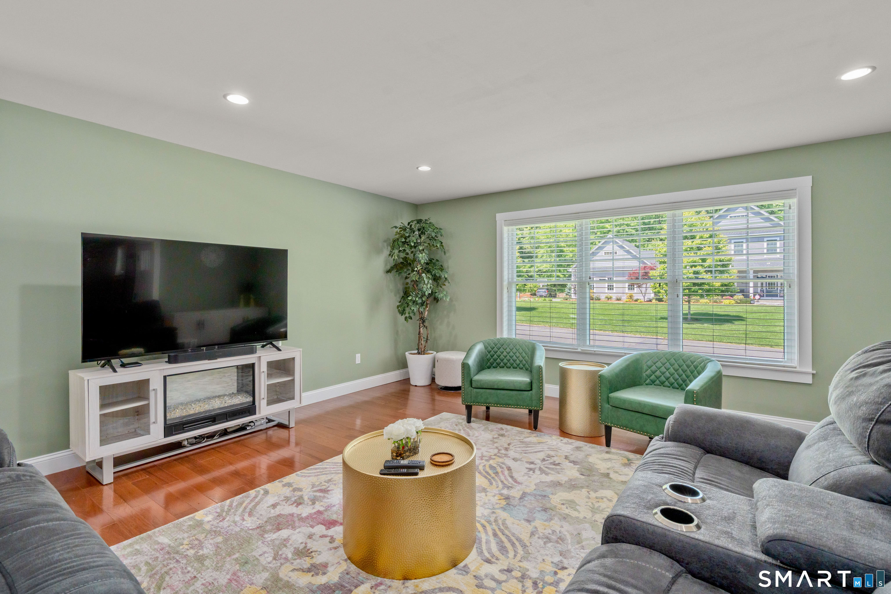 5 Limric Lane Suffield, CT 06078 - Photo 3 of 36 a living room with furniture and a flat screen tv