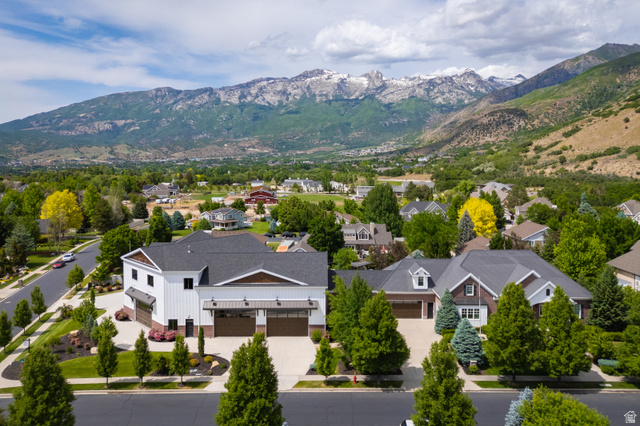 1263 Chapman Court Alpine, UT 84004 - Photo 3 of 83 Aerial perspective of suburban area featuring a mountain backdrop