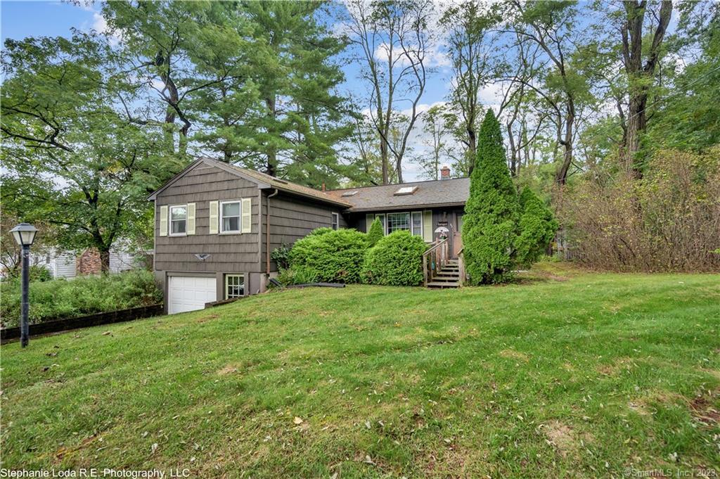43 Woolam Road East Windsor, CT 06088 - Photo 1 of 1 a view of a house with a yard