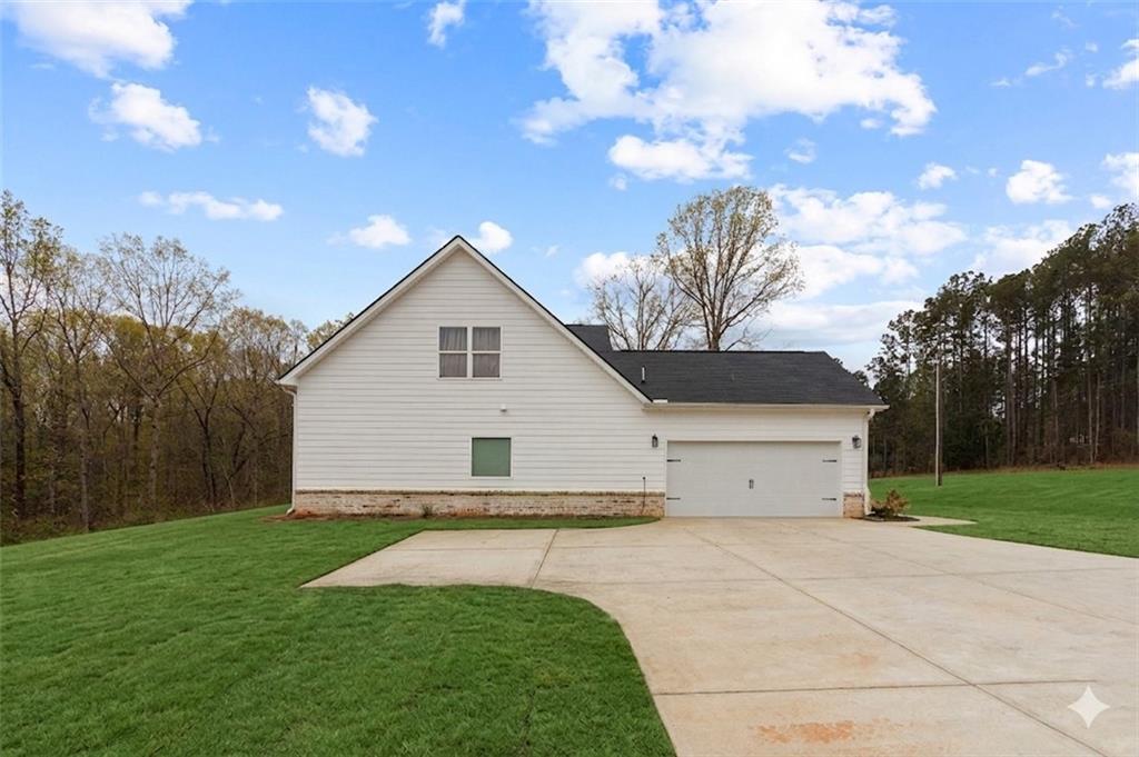 171 Strickland Loop Forsyth, GA 31029 - Photo 22 of 25 a view of a backyard of the house