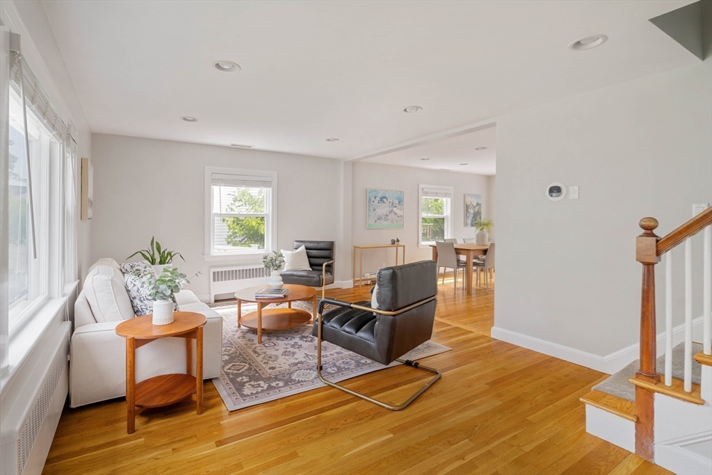 41 Wilson Avenue, Unit 41 Watertown, MA 02472 - Photo 11 of 22 a living room with furniture windows and a table