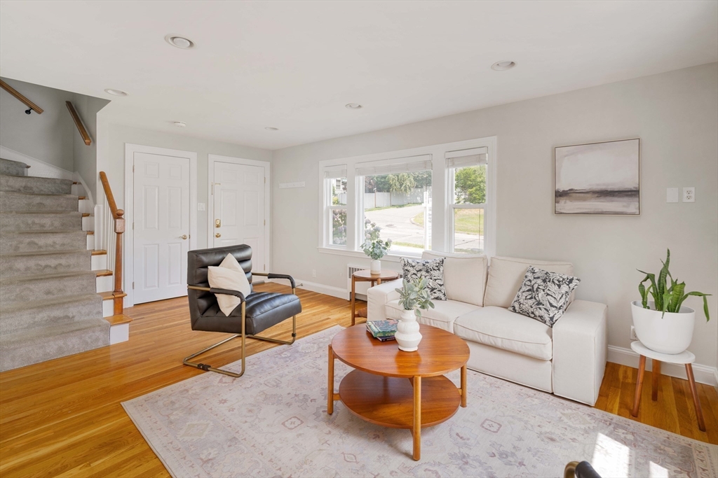 41 Wilson Avenue, Unit 41 Watertown, MA 02472 - Photo 12 of 22 a living room with furniture and wooden floor