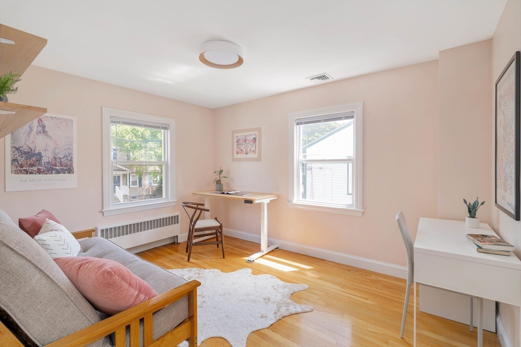 41 Wilson Avenue, Unit 41 Watertown, MA 02472 - Photo 18 of 22 a living room with furniture and a window