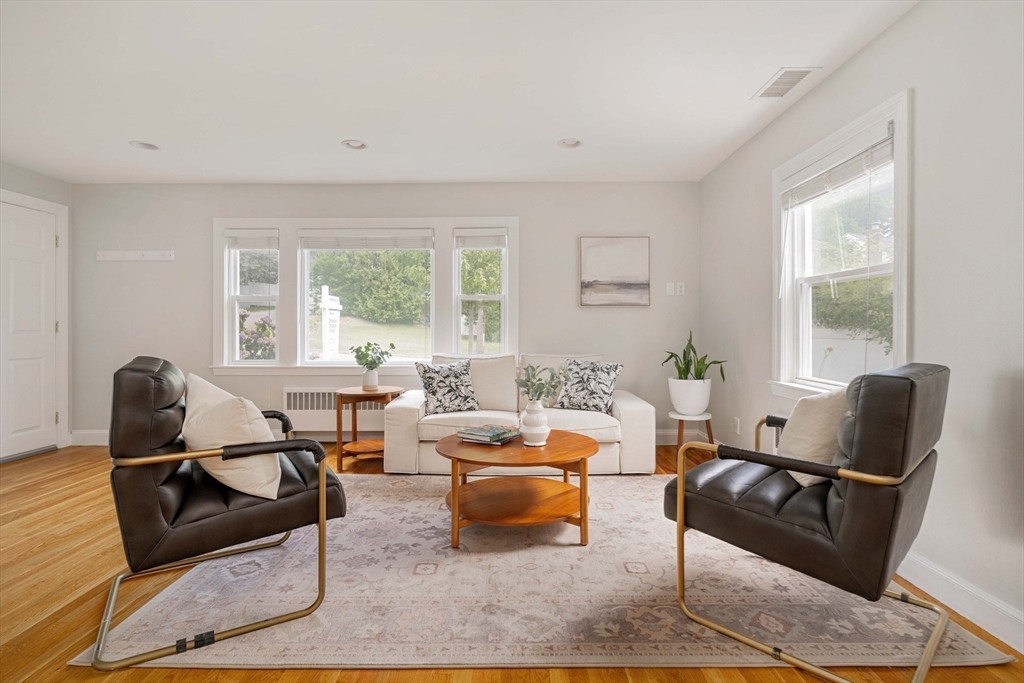 41 Wilson Avenue, Unit 41 Watertown, MA 02472 - Photo 10 of 22 a living room with furniture and a window