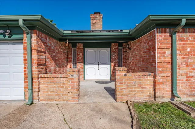 a front view of a house with a outdoor space